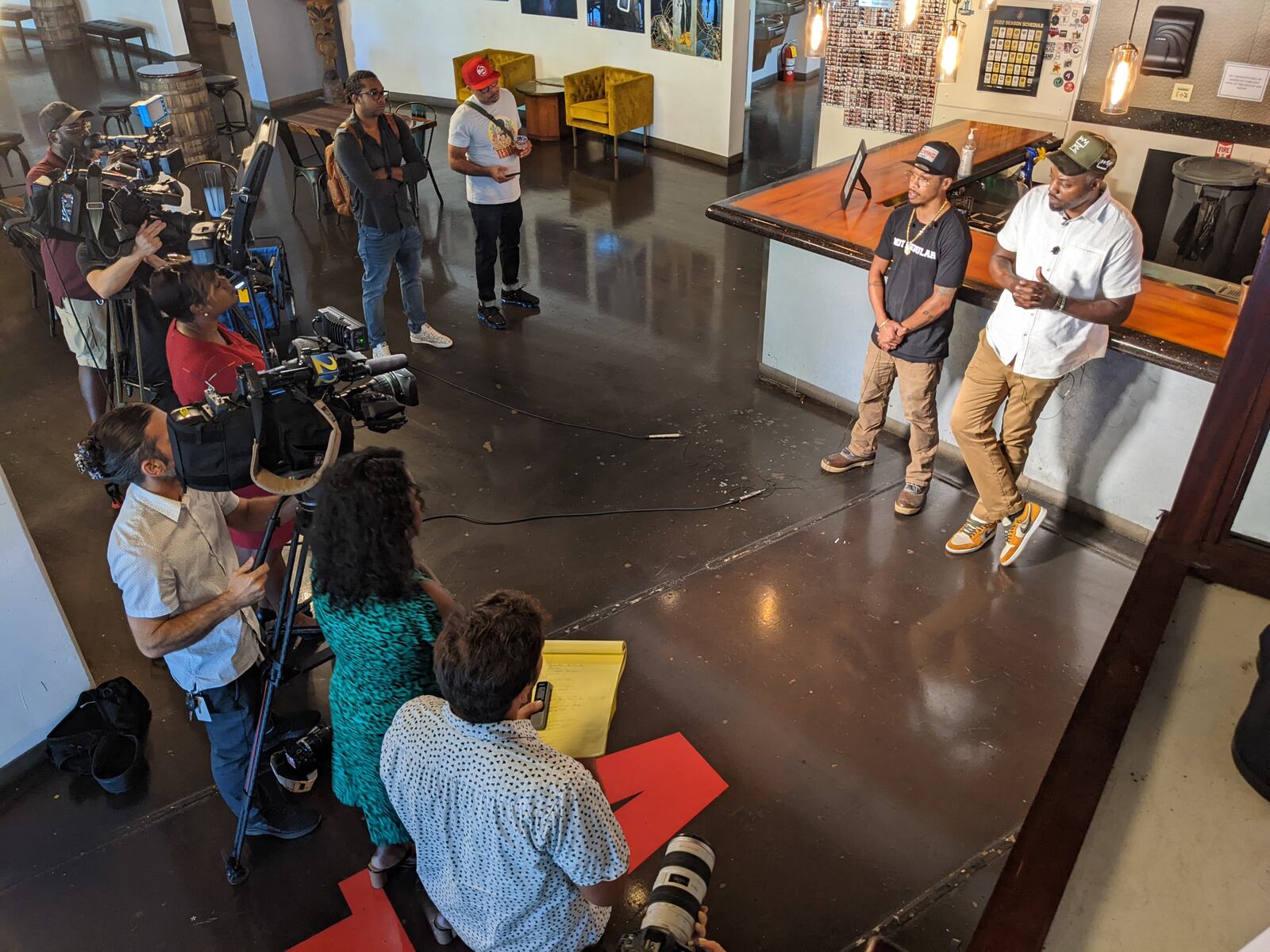 Skinny DeVille (left) and Fish Scales, founders of Atlantucky Brewing in Atlanta, talk to members of the media about the brewery's second anniversary. Courtesy of Atlantucky Brewing