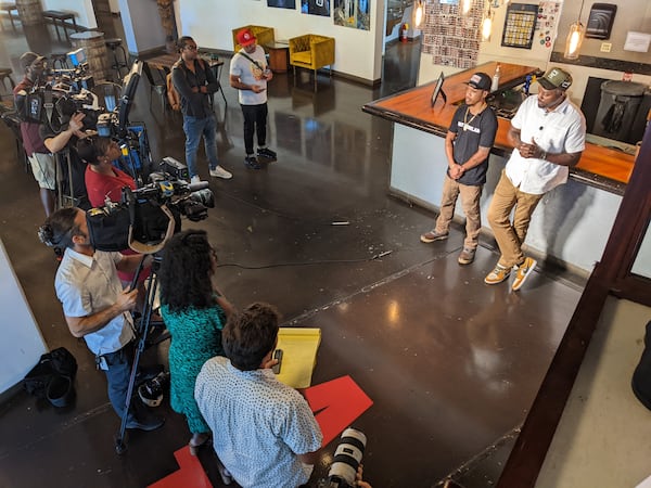 Skinny DeVille (left) and Fish Scales, founders of Atlantucky Brewing in Atlanta, talk to members of the media about the brewery's second anniversary. Courtesy of Atlantucky Brewing