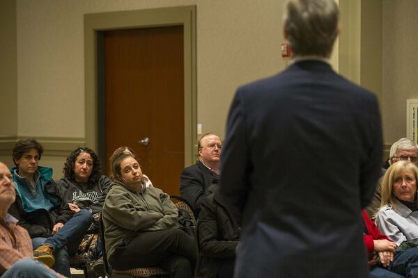 Concerned citizens listen as a new mixed-used development is presented to them Thursday. (ALYSSA POINTER/ALYSSA.POINTER@AJC.COM)