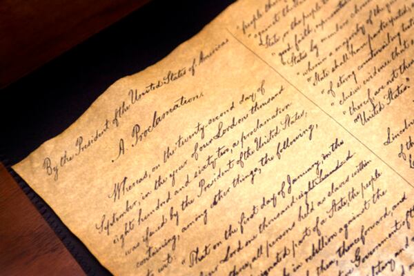 A replica of the Emancipation Proclamation sits on a desk in a bedroom President Lincoln's Cottage. Rick McKay/COX Newspapers