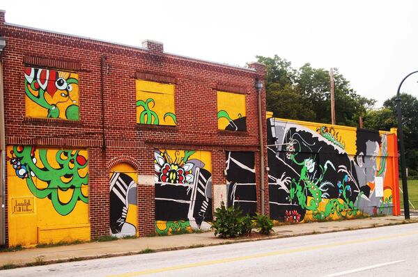 Artists Matt Haffner and Laura Bell's Living Walls mural in Summerhill. (Photo: Elizabeth Montgomery/Elizabeth.Montgomery@ajc.com) Artists Matt Haffner and Laura Bell created this mural for Living Walls in Summerhill. (Photo: Elizabeth Montgomery/Elizabeth.Montgomery@ajc.com)