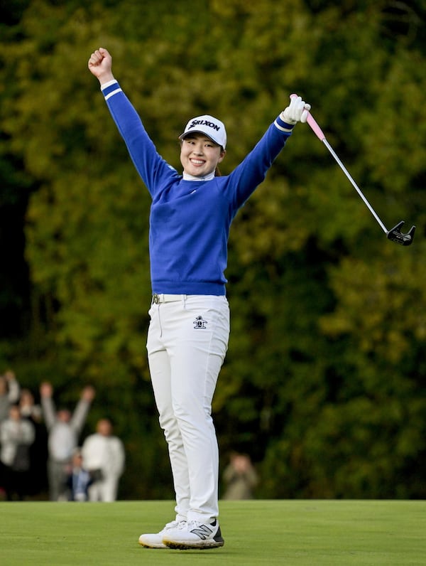 Rio Takeda of Japan reacts as she wins the LPGA's Toto Japan Classic in a playoff at the Seta Golf Course in Otsu, western Japan, Sunday, Nov. 3, 2024. (Keiji Uesho/Kyodo News via AP)