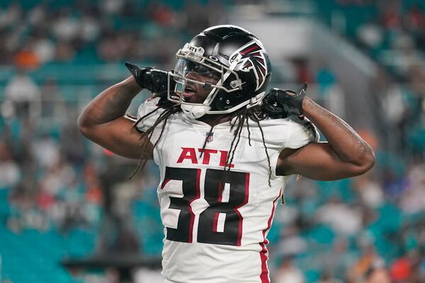 Falcons running back D'Onta Foreman (38) looks up after scoring a touchdown during the second half against the Miami Dolphins, Saturday, Aug. 21, 2021, in Miami Gardens, Fla. (AP Photo/Lynne Sladky)