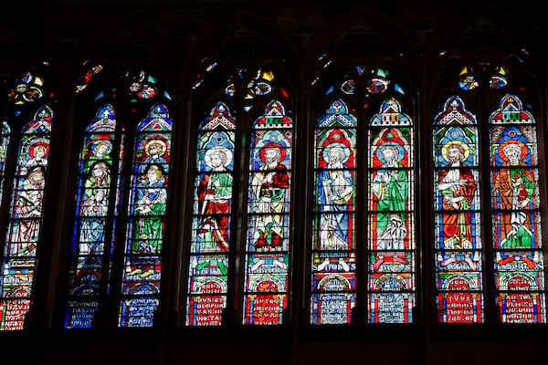 Stained glass windows are seen inside Notre-Dame de Paris cathedral while French President Emmanuel Macron visits the restored interiors of the monument, Friday Nov. 29, 2024, in Paris. (Stephane de Sakutin, Pool via AP)