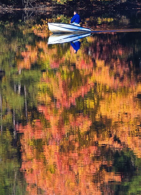 Greg Abbott of Conyers took advantage of the mild weather and went fishing Friday in Stone Mountain. JOHN SPINK / JSPINK@AJC.COM