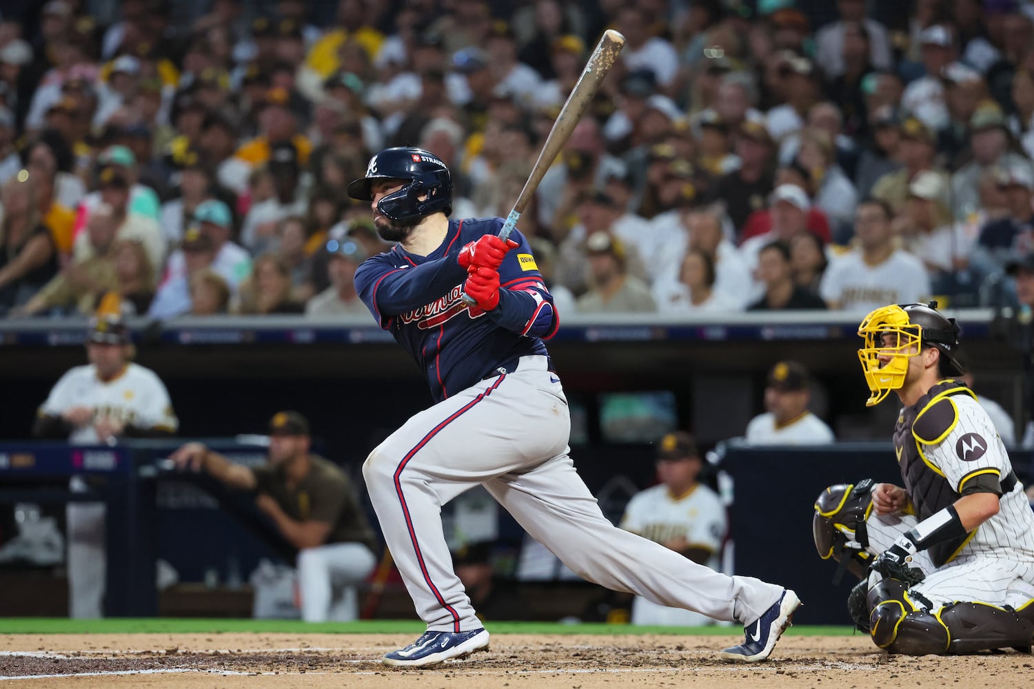 Atlanta Braves catcher Travis d'Arnaud (16) doubles against the San Diego Padres during the fourth inning of National League Division Series Wild Card Game One at Petco Park in San Diego on Tuesday, Oct. 1, 2024.   (Jason Getz / Jason.Getz@ajc.com)