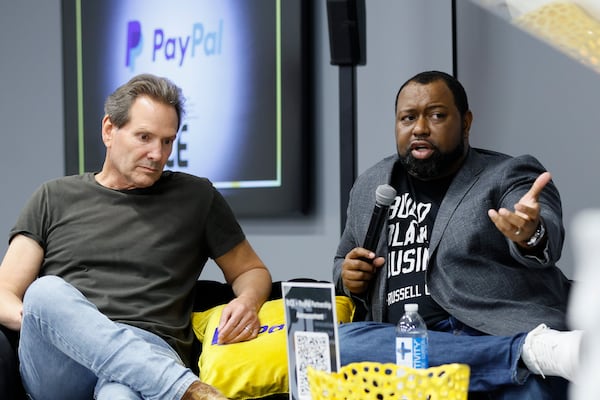  Jay Bailey, President & CEO of Russell Innovation Center for Entrepreneurs (right), speaks as Dan Schulman, President and CEO of PayPal, listens during a panel presentation in Atlanta on Tuesday, Aug. 29, 2023. The Russell Innovation Center for Entrepreneurs (RICE) has received a $1 million grant from PayPal Holdings, Inc. to establish the PayPal Retail Academy. This academy will offer Atlanta-based entrepreneurs a comprehensive curriculum, coaching, tools, and resources for business growth.

Miguel Martinez /miguel.martinezjimenez@ajc.com