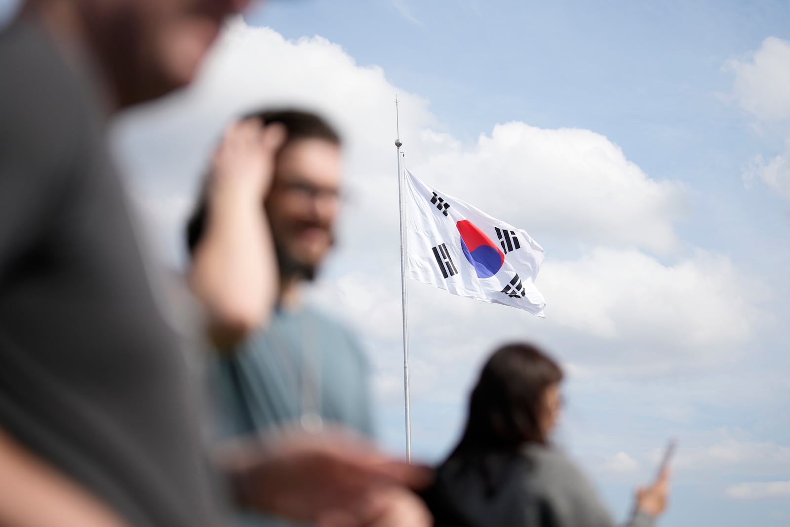 A South Korean national flag flutters in the wind at the Unification Observation Post in Paju, South Korea, Wednesday, Oct. 9, 2024. (AP Photo/Lee Jin-man)