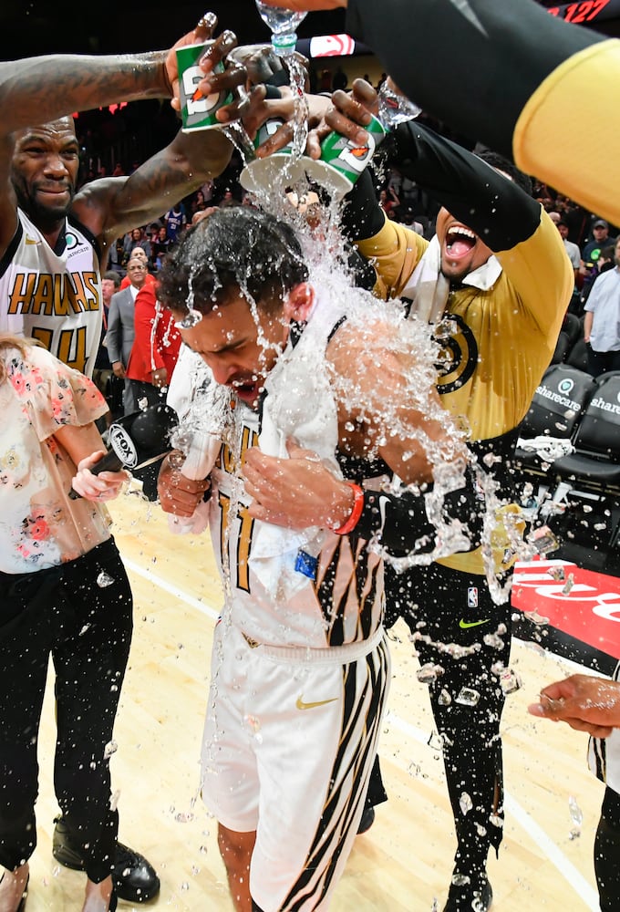 Photos: Trae Young, Hawks celebrate another win