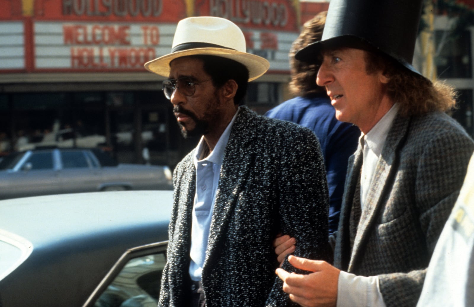 Richard Pryor and Gene Wilder walking down street in scene from the film 'Another You', 1991. (Photo by TriStar/Getty Images)