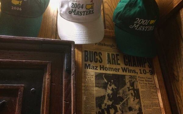 Some of Herb Waterhouse's sports memorabilia. The Johns Creek resident has seen three World Series, three Super Bowls and every Masters since 1953.