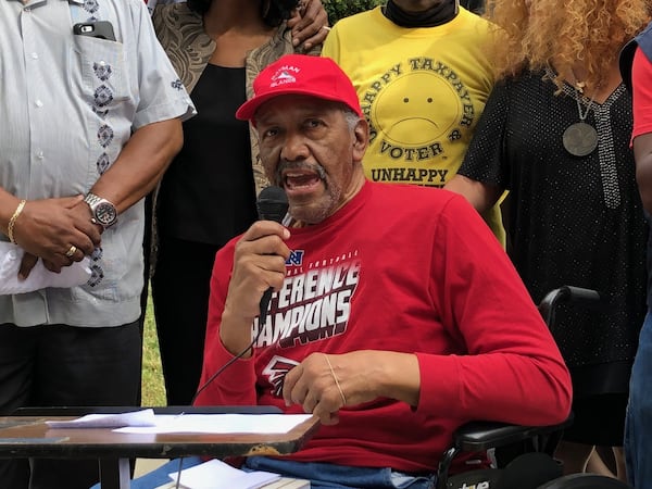 John Evans protests a lack of transit service in east and south DeKalb County at a recent MARTA Board of Directors meeting.