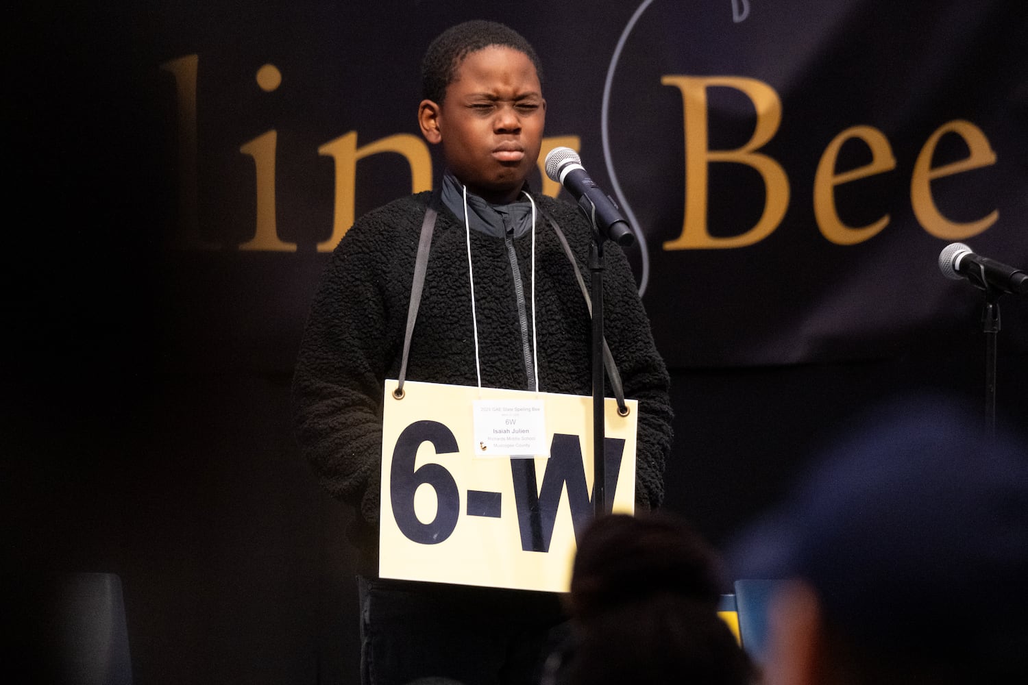 Isaiah Julien reacts after misspelling a word at the GAE State Spelling Bee Championship at Georgia State University in Atlanta on Friday, March 21, 2025.   Ben Gray for the Atlanta Journal-Constitution