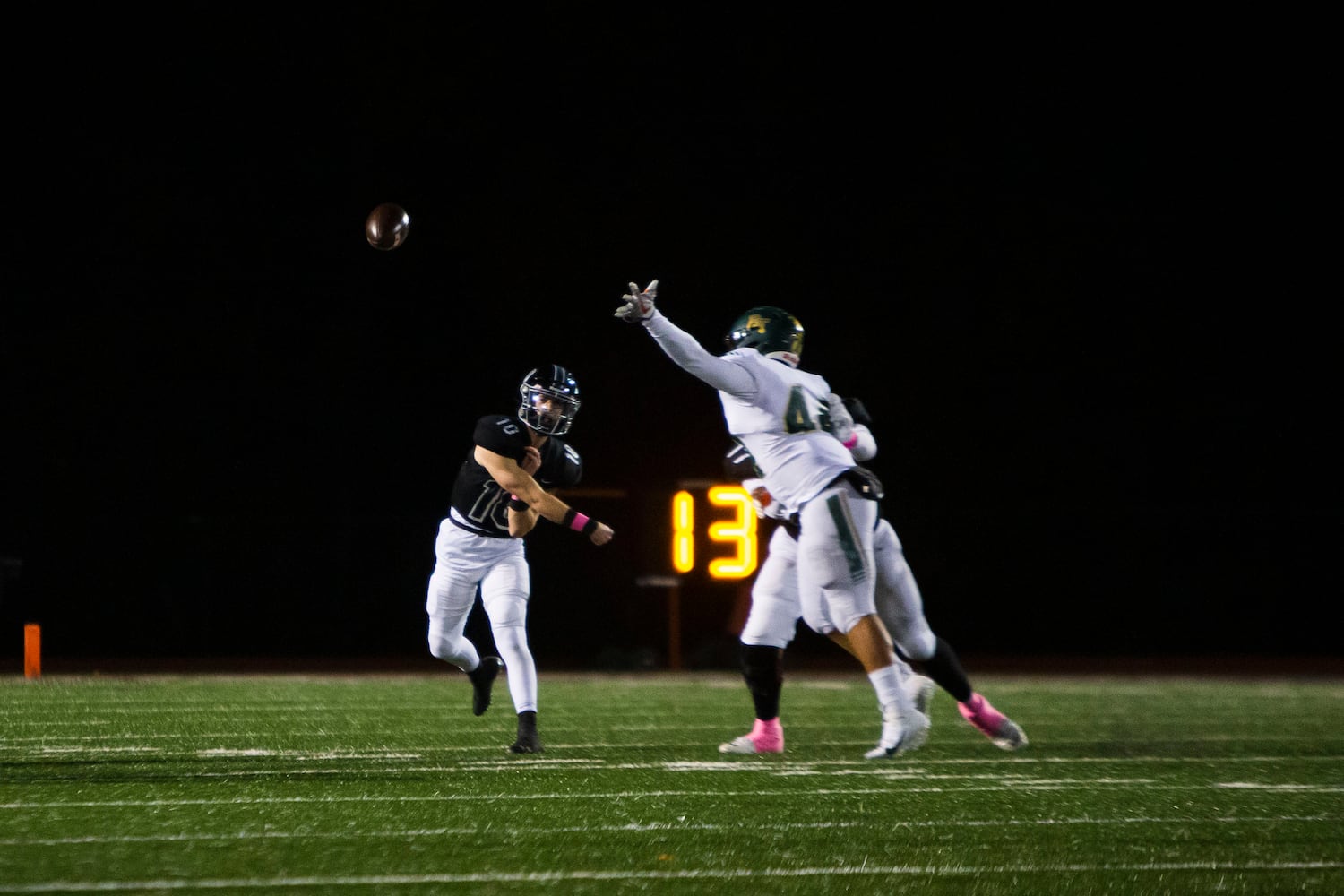 Ben Guthrie, quarterback for Alpharetta, passes the ball during the Alpharetta vs. Blessed Trinity high school football game on Friday, October 28, 2022, at Alpharetta high school in Alpharetta, Georgia. Alpharetta led Blessed Trinity 21-7 at the end of the first half.