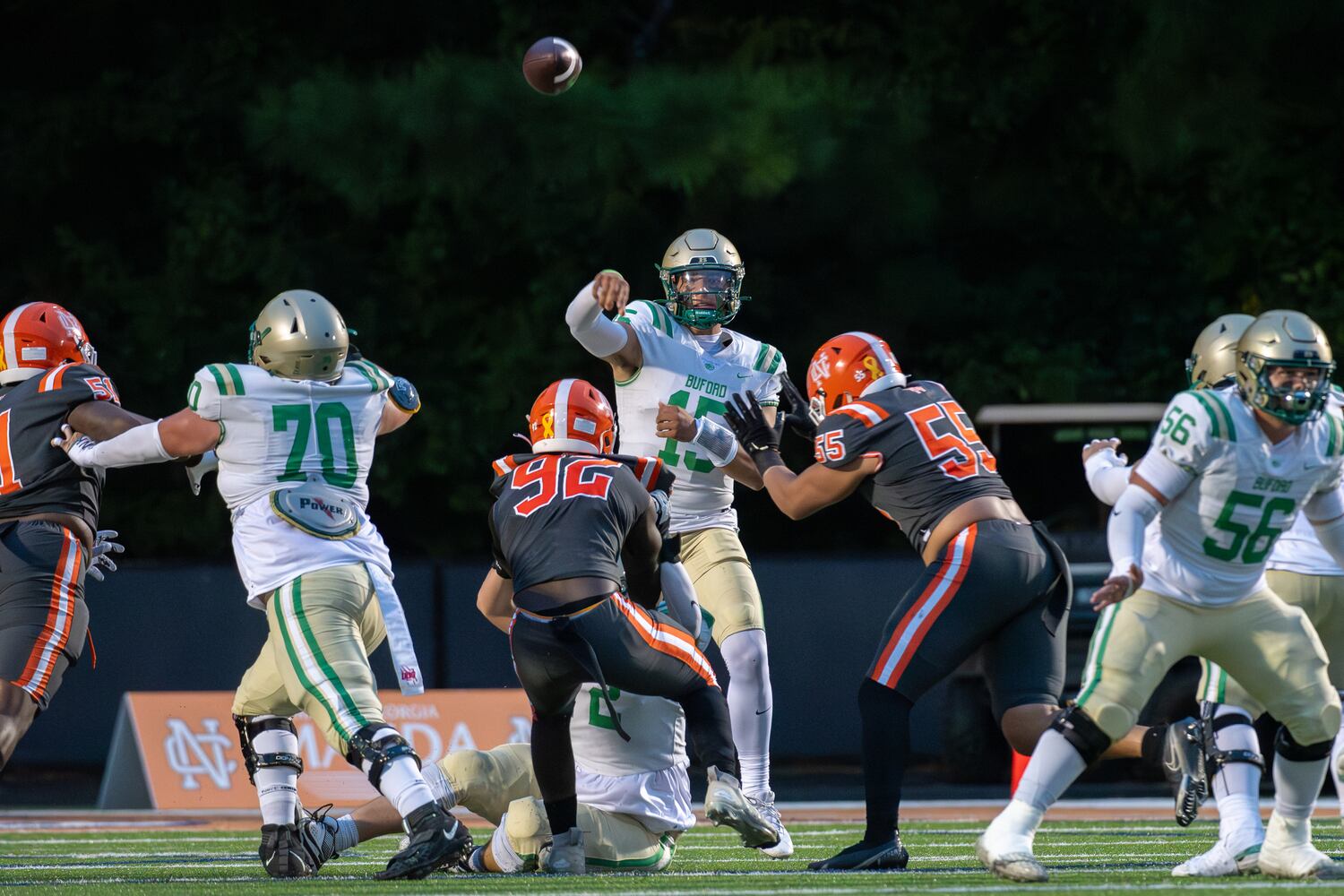 Buford quarterback Dylan Raiola throws downfield during Friday's game at North Cobb. (Jamie Spaar/For the AJC)