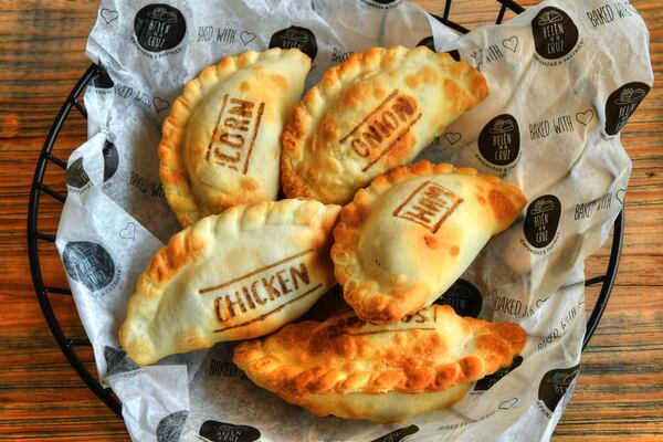 An assortment of empanadas from Belén de la Cruz Empanadas & Pastries. Argentine empanadas are always baked. (Chris Hunt for The Atlanta Journal-Constitution)