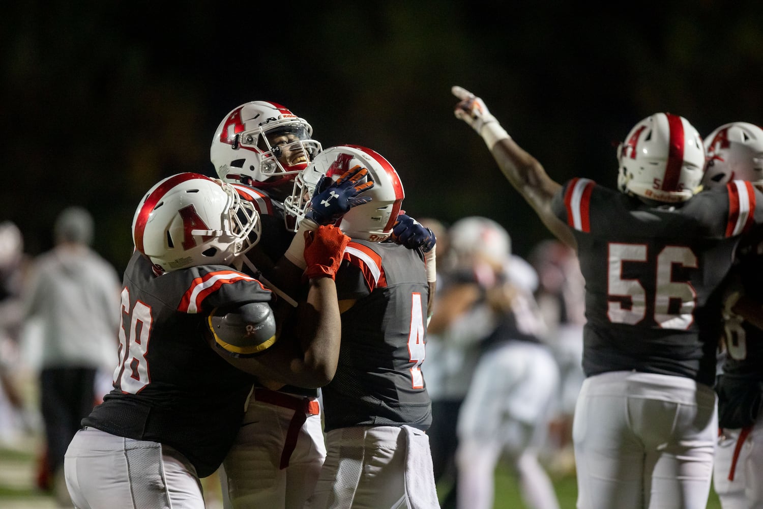 Archer players celebrate at a GHSA high school football game between Archer High School and Norcross High School in Lawrenceville, GA., on Friday, November 5, 2021. Archer won 9-0. (Photo/Jenn Finch)