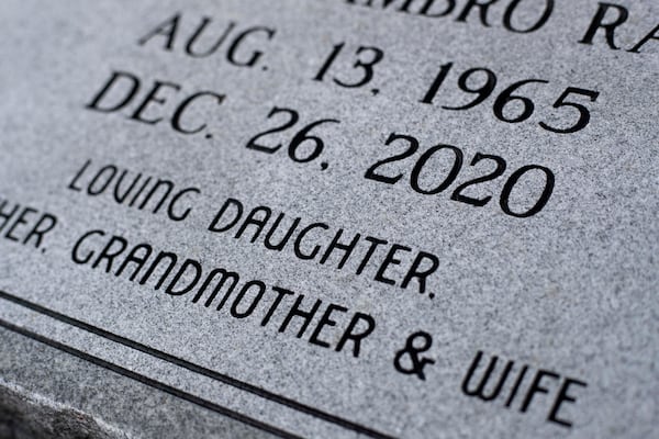 A finished gravestone is displayed at The Engraving House in Lithonia, Thursday, October 7, 2021. (Alyssa Pointer/ Alyssa.Pointer@ajc.com)