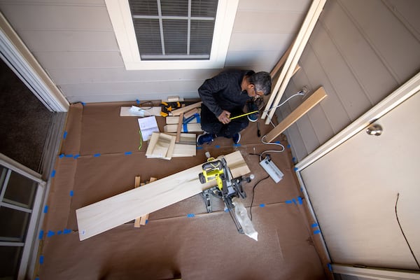 Anil Joseph works on a side table for his daughter at his Marietta home. Joseph says that he was not confident of his crafting skills before the pandemic. Now, he and his wife plan to buy a house, and he has a bigger plan: “Every single piece of furniture in that house is going to be made by me.” (STEVE SCHAEFER FOR THE ATLANTA JOURNAL-CONSTITUTION)