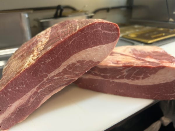 Brisket, which is often the basis for corned beef, according to Reuben’s owner Claudio Furgiuele, has internal and external fat in amounts that distinguish it from a round cut. (Photo contributed by Reuben’s)