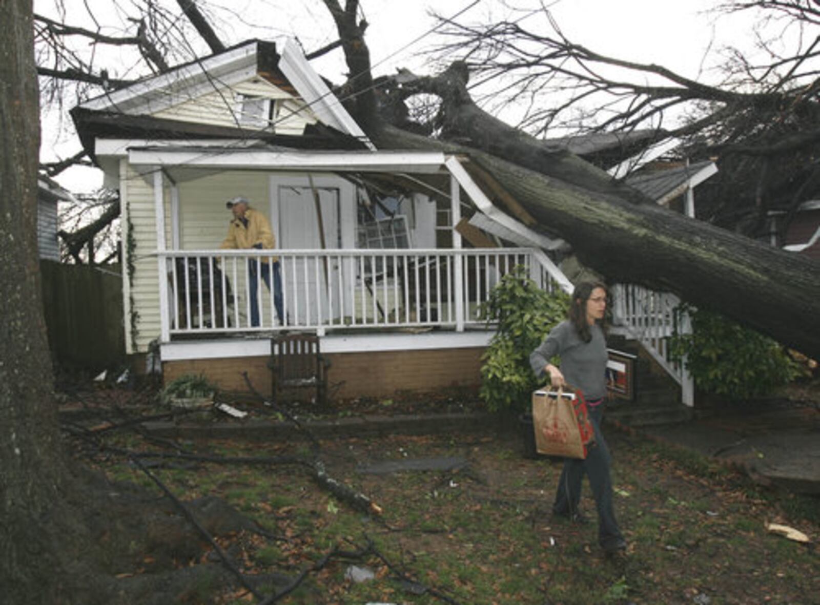 Then: The Cabbagetown area of Atlanta was one of the hardest hit by the tornado that tore through the city in March 2008. This house, at 252 Powell Street, was severely damaged.