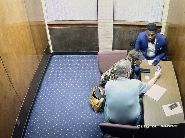 A Morrow detective shows Clayton County Commissioner Felicia Franklin video of her getting drinks at a sports bar.