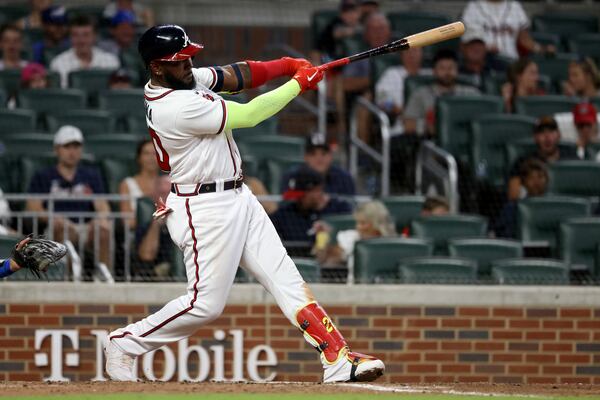 Braves designated hitter Marcell Ozuna hits a two-run home run against the Los Angeles Dodgers during the eighth inning to take a 5-3 lead at Truist Park Saturday, June 25, 2022, in Atlanta. (Jason Getz / Jason.Getz@ajc.com)