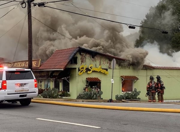 Crews battled a large fire that started Thursday morning inside a Gainesville Mexican restaurant.