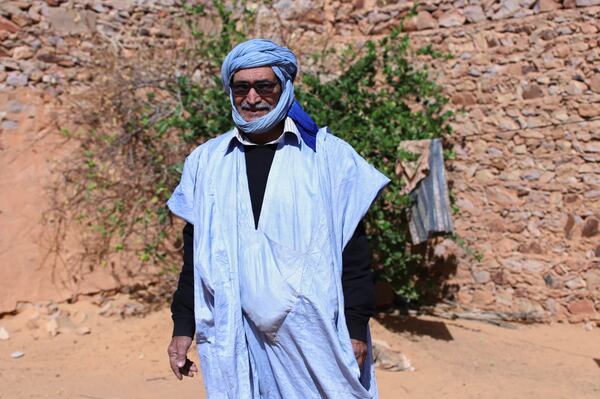 Retired teacher Mohamed Lemine Bahane poses for a photo on Jan. 13 2025, in Chinguetti, Mauritania. (AP Photo/Khaled Moulay)