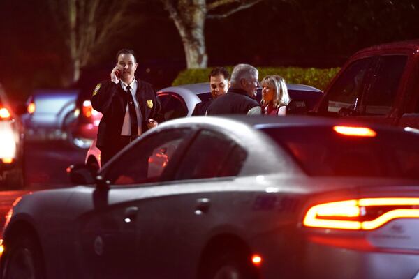 Friends, family, police officers and community members arrive for the visitation for Henry County police Officer Michael Smith at Cannon Cleveland Funeral Directors in McDonough on Wednesday, January 2, 2019. Smith died on December 28, 2018, due to complications from a gunshot wound he suffered on December 6, according to Henry County police. He was 33 years old. 