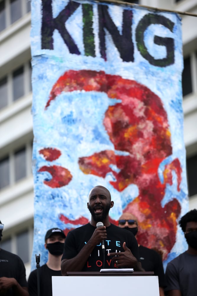 PHOTOS: Thousands march at Georgia Capitol as lawmakers return