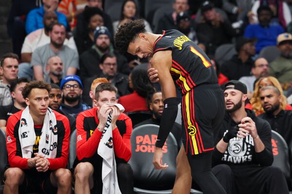 Hawks forward Jalen Johnson reacts after injuring his shoulder during a Jan. 23 game against the Raptors.