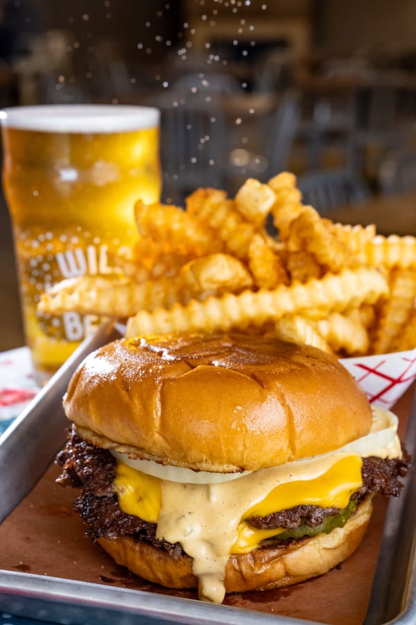 Among the Fox Bros. Bar-B-Q menu items at the new Toco Hill location of Wild Heaven is a smashburger. (Courtesy of Chris Rank)