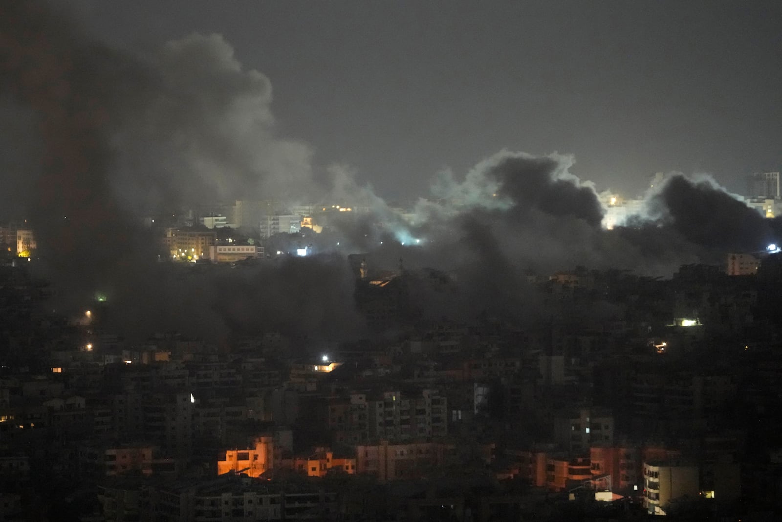 Smoke rises from Israeli airstrikes on Dahiyeh, in the southern suburb of Beirut, Lebanon, early Friday, Nov. 1, 2024. (AP Photo/Hussein Malla)