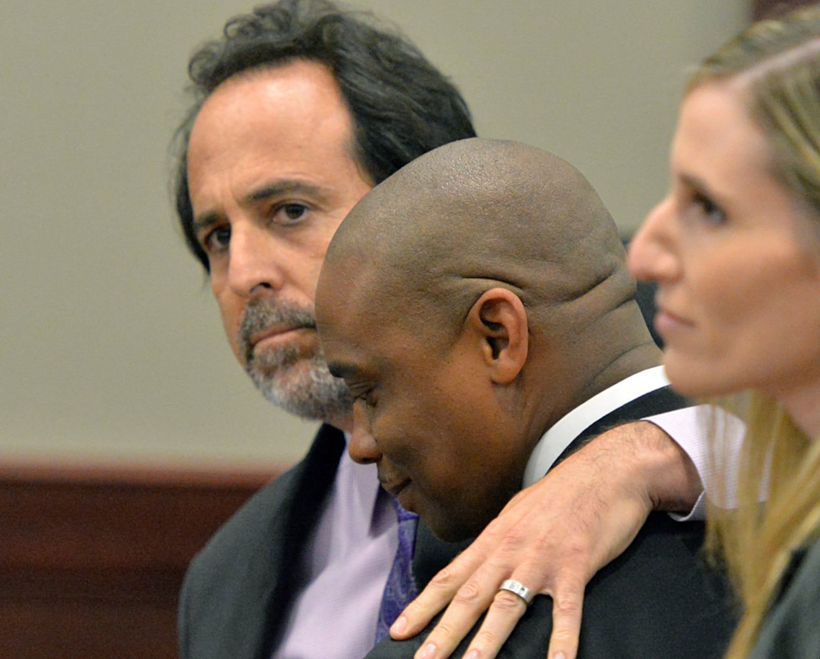 NOT GUILTY--August 15, 2013 Jonesboro - Clayton County Sheriff Victor Hill (second from left) and his defense attorney Drew Findling (left) stand together as they listen to the verdict at Clayton County Superior Court on Thursday, August 15, 2013. Victor Hill was cleared on all counts in racketeering trial and will remain in his position as sheriff. HYOSUB SHIN / HSHIN@AJC.COM