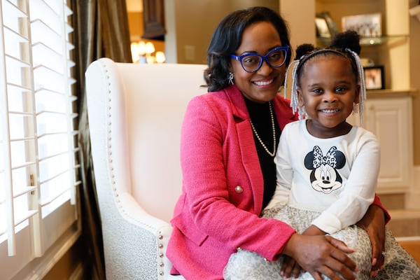 Dr. Maya McCarthy, a pediatrician in Atlanta, is pictured with her daughter Charlotte, age 3, in their living room on Sunday, February 12, 2024. During her pregnancy, she experienced preeclampsia ad HELLP syndrome, leading to an emergency c-section and the premature birth of Charlotte at 25 weeks. Charlotte, weighing only one pound, survived against her mother's fears of losing her own life.

Miguel Martinez /miguel.martinezjimenez@ajc.com