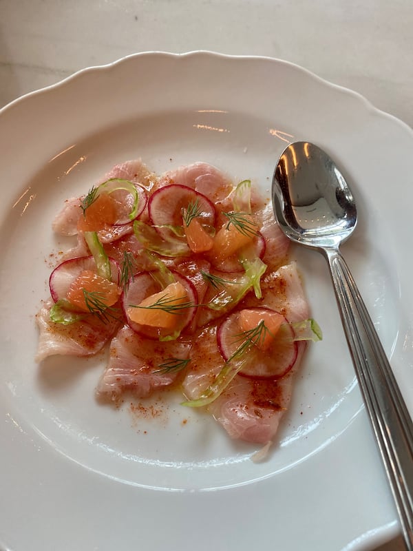 This raw hamachi at Lucian glistens with grapefruit, celery, radish and a sprinkle of Berbere spice. Wendell Brock for the Atlanta Journal-Constitution