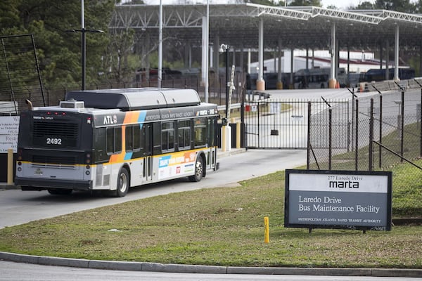 MARTA employee Shyanne Lord is suing the agency, claiming that while she worked at the Laredeo Drive bus garage, pictured here, she endured sexual harassment from a co-worker on a near-daily basis. After she lodged a formal complaint, she says MARTA discounted her claims and retaliated by transferring her to a less-desirable garage. ALYSSA POINTER / ALYSSA.POINTER@AJC.COM