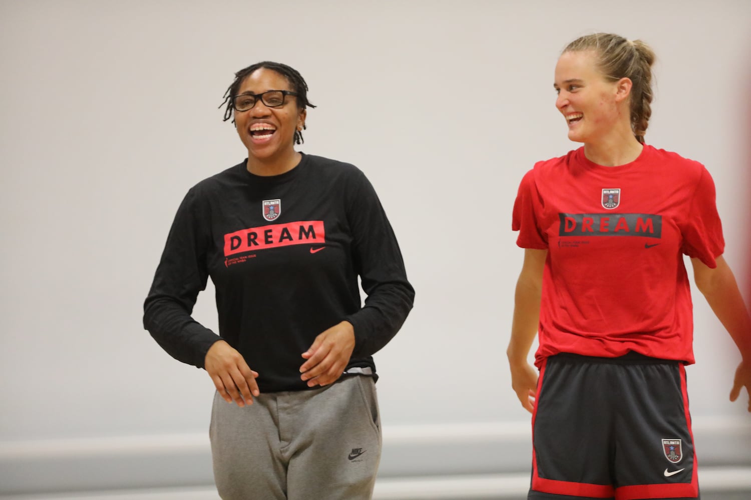 Atlanta Dream head coach Tanisha Wright smiles with the team during a practice session on Monday, April 18, 2022. Miguel Martinez/miguel.martinezjimenez@ajc.com