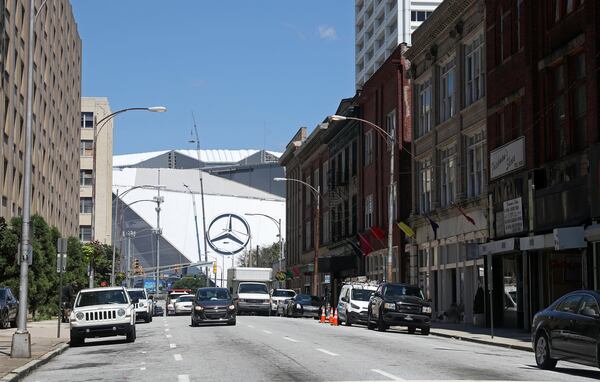 Mercedes-Benz Stadium is shown in the distance along Mitchell Street. Newport Holding, a German-backed development firm, has recently acquired buildings stretching over several blocks of downtown Atlanta, including some on Mitchell Street. PHOTO / JASON GETZ