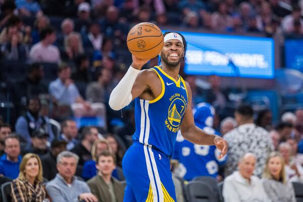 Golden State Warriors forward Jimmy Butler III looks on during the first half of an NBA basketball game against the Portland Trail Blazers in San Francisco, Monday, March 10, 2025. (AP Photo/Nic Coury)