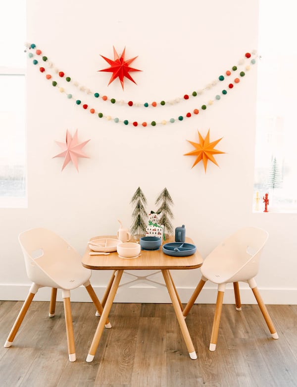 A three-piece desk and chair set is personal space for toddlers to eat, sit and draw and more.