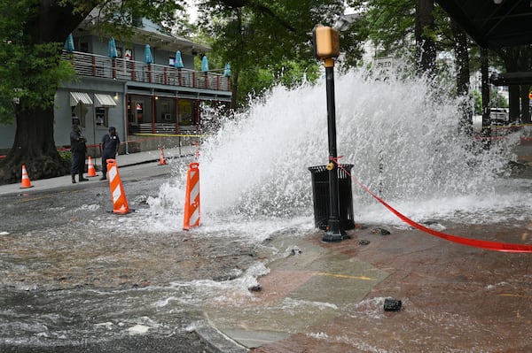 A water main break at the corner of 11th and Peachtree streets was one of several impacting the city Saturday morning.