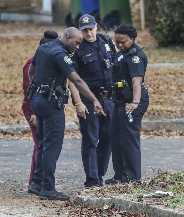 Atlanta police work the scene of the attack on Tuesday. JOHN SPINK /JSPINK@AJC.COM