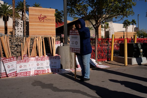 Members of the Culinary Workers Union picket in front of the Virgin Hotels Las Vegas, Friday, Nov. 15, 2024, in Las Vegas. (AP Photo/John Locher)