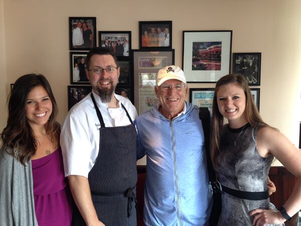 Jimmy Buffett at the Buckhead Diner with Kait Davis, left, Chef Charlie Schwab and Emily Gober.