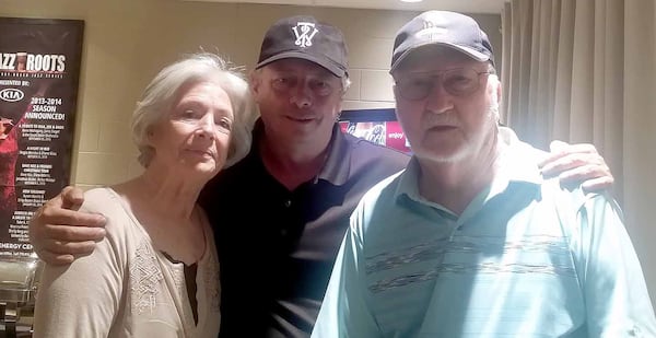 James McAuliffe, shown with his mother and step-father, Diane and Harley Vaughn, had a chance to catch up at a concert earlier this year in Cobb County.  (Photo: Special to The AJC)