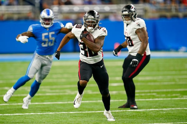 Atlanta Falcons running back Qadree Ollison rushes during the first half of a preseason NFL football game against the Detroit Lions, Friday, Aug. 12, 2022, in Detroit. (AP Photo/Paul Sancya)