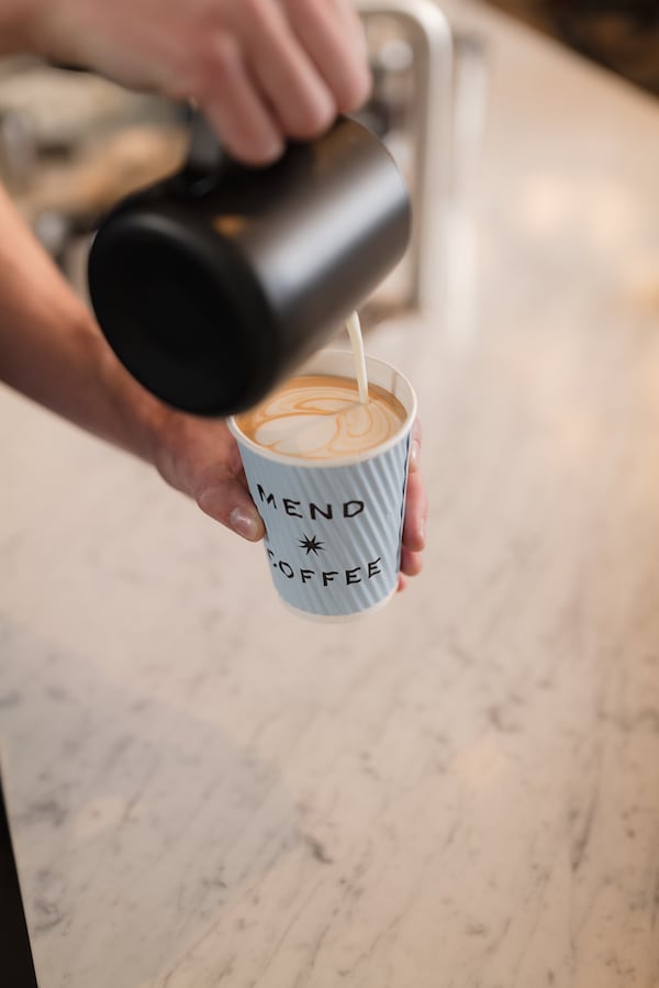 Mend Coffee offers a variety of coffee drinks using beans roasted by locally-based Bellwood Coffee. / Courtesy of Bryan Johnson Studio