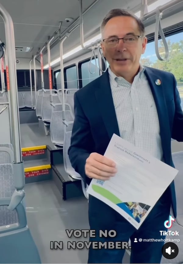 Gwinnett County Commissioner Matthew Holtkamp rode an empty bus in a social media post urging voters to reject e referendum to fund transit in the county.